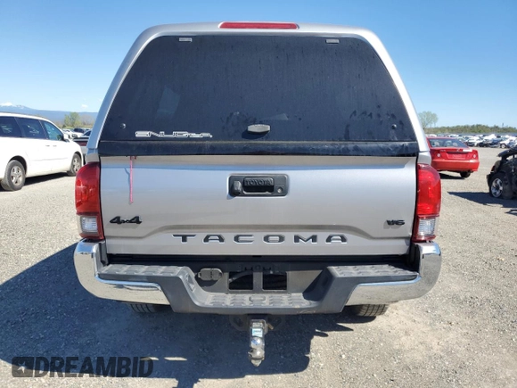 2021 Toyota Tacoma SR5 with VIN 3TMDZ5BN0MM103256, listed as a Copart auction lot 50101675 with 49,673 mi miles and Salvage title. Bid and sale history available at DreamBid. Image 6.