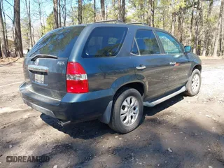 2003 Acura MDX Touring Pkg RES w/Navigation System with VIN 2HNYD18953H547128, listed as a IAAI auction lot 41865267 with 178,855 mi miles. Bid and sale history available at carsss.com. Image 4.