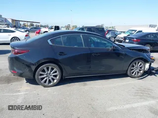 2021 Mazda 3 Select with VIN 3MZBPABL2MM250695, listed as a IAAI auction lot 42001485 with 29,672 mi miles and . Bid and sale history available at DreamBid. Image 13.