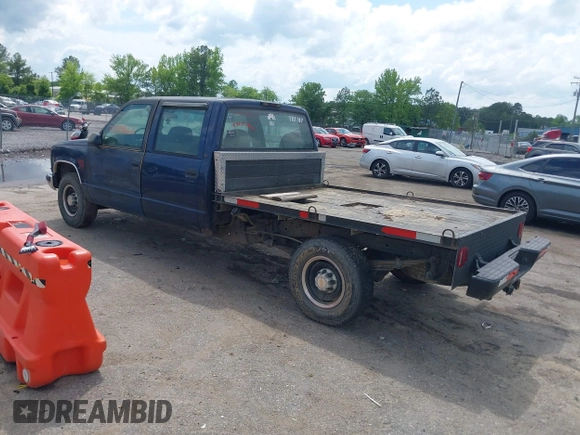 2000 GMC Sierra 3500 z VIN 1GTGC33R1YF502154, wystawiony jako IAAI lot #42183662 z przebiegiem 157 504 mil mil oraz . Historia ofert i sprzedaży dostępna na DreamBid. Obrazek 3.
