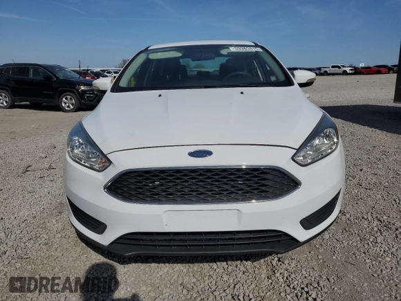 2017 Ford Focus SE z VIN 1FADP3F22HL312683, wystawiony jako Copart lot #53385315 z przebiegiem 88 751 mil mil oraz Szkoda całkowita • Salvage title. Historia ofert i sprzedaży dostępna na DreamBid. Obrazek 5.