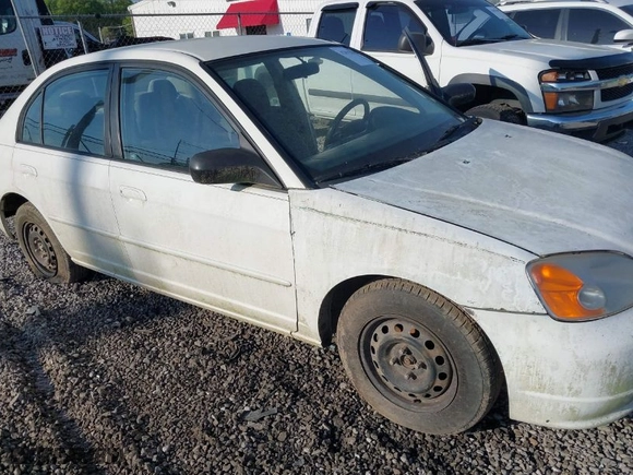2003 Honda Civic LX with VIN 1HGES16523L014348, listed as a IAAI auction lot 42015881 with 271,832 mi miles. Bid and sale history available at carsss.com. Image 6.