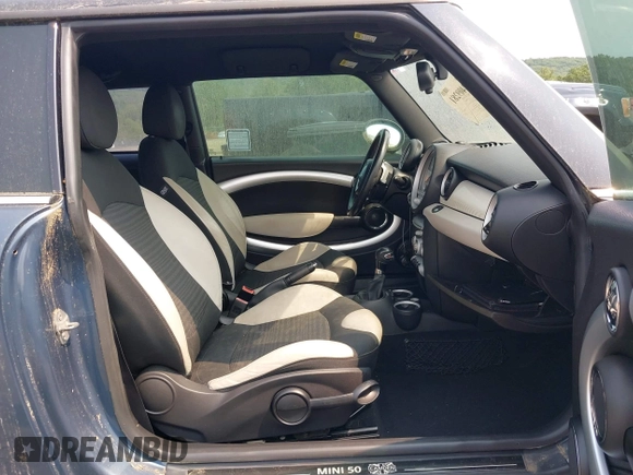 2010 MINI Hardtop S with VIN WMWMF7C54ATZ74321, listed as a IAAI auction lot 42409281 with 193,547 mi miles and . Bid and sale history available at DreamBid. Image 5.