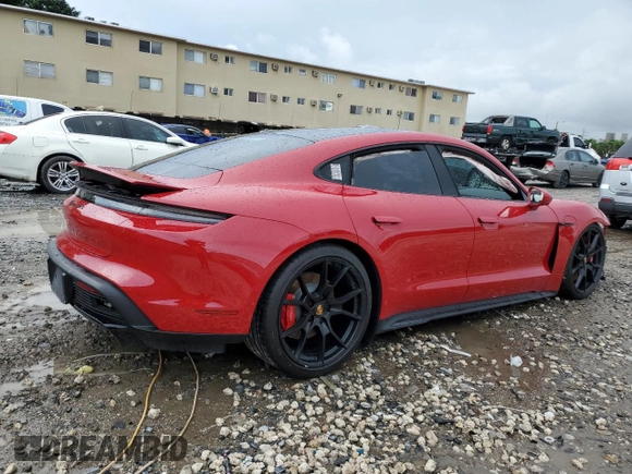 2024 Porsche Taycan GTS with VIN WP0AD2Y11RSA47589, listed as a Copart auction lot 73954444 with 4,452 mi miles and Salvage Title. Bid and sale history available at DreamBid. Image 3.