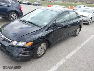 2007 Honda Civic Sdn EX with VIN 1HGFA16887L046597, listed as a IAAI auction lot 41845057 with 125,043 mi miles. Bid and sale history available at carsss.com. Image 6.