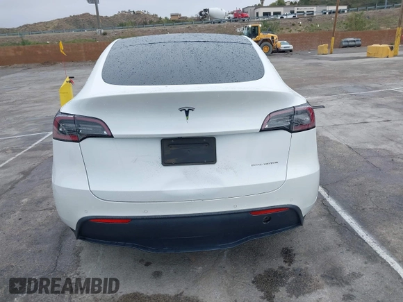 2020 Tesla Model Y Long Range with VIN 5YJYGDEE2LF022484, listed as a IAAI auction lot 41798662 with 108,978 mi miles and . Bid and sale history available at DreamBid. Image 16.