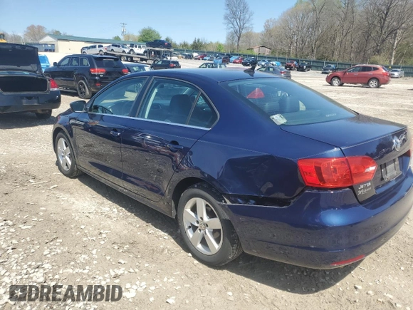 2013 Volkswagen Jetta TDI w/Premium с VIN 3VWLL7AJ1DM408026, выставлен на аукционе Copart как лот 51115825 с пробегом 98 586 миль миль и Списание • Salvage title. История ставок и продаж доступна на DreamBid. Изображение 2.