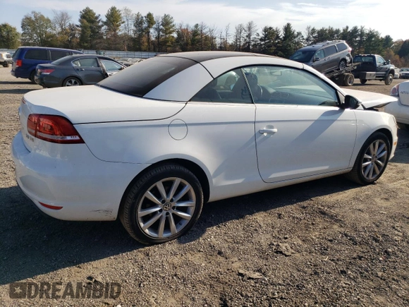 2015 Volkswagen Eos Komfort with VIN WVWBW8AH1FV000692, listed as a Copart auction lot 77866694 with 114,156 mi miles and Salvage Title. Bid and sale history available at DreamBid. Image 3.