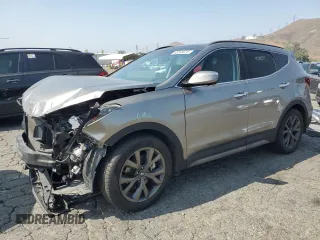 2018 Hyundai Santa Fe Ultimate z VIN 5XYZW4LA6JG563230, wystawiony jako Copart lot #60245075 z przebiegiem 81 644 mil mil oraz Szkoda całkowita • Salvage title. Historia ofert i sprzedaży dostępna na DreamBid. Obrazek 1.