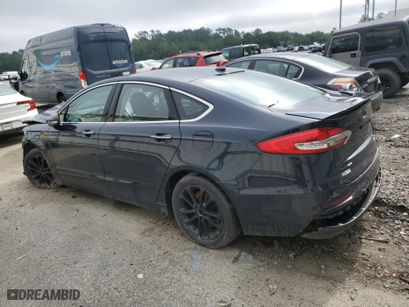2020 Ford Fusion Plug-In Hybrid Titanium with VIN 3FA6P0SU6LR158133, listed as a Copart auction lot 56468884 with 57,585 mi miles. Bid and sale history available at carsss.com. Image 2.