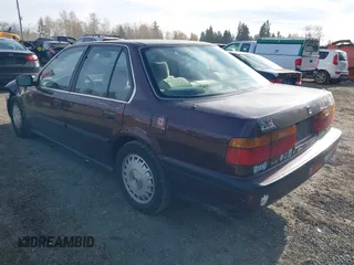 1990 Honda Accord EX with VIN JHMCB7561LC077247, listed as a IAAI auction lot 40819375 with 329,769 mi miles. Bid and sale history available at carsss.com. Image 3.