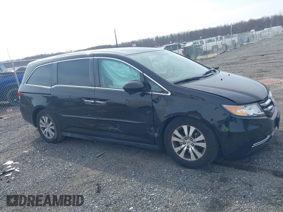 2017 Honda Odyssey EX-L with VIN 5FNRL5H65HB026014, listed as a IAAI auction lot 41719790 with 61,429 mi miles and . Bid and sale history available at DreamBid. Image 13.