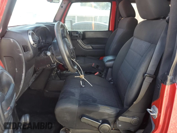 2012 Jeep Wrangler Sport with VIN 1C4AJWAGXCL194071, listed as a Copart auction lot 48008795 with 109,658 mi miles and Salvage title. Bid and sale history available at DreamBid. Image 7.