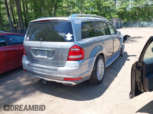 2012 Mercedes-Benz GL-Class GL 450 with VIN 4JGBF7BE7CA766309, listed as a IAAI auction lot 42209335 with 175,470 mi miles. Bid and sale history available at carsss.com. Image 4.