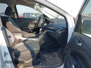 2016 Ford Escape SE z VIN 1FMCU0GXXGUC13444, wystawiony jako IAAI lot #39566364 z przebiegiem 162 059 mil mil oraz . Historia ofert i sprzedaży dostępna na DreamBid. Obrazek 5.