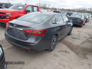 2018 Toyota Avalon XLE with VIN 4T1BK1EB9JU275097, listed as a IAAI auction lot 41940585 with 119,854 mi miles and . Bid and sale history available at DreamBid. Image 4.