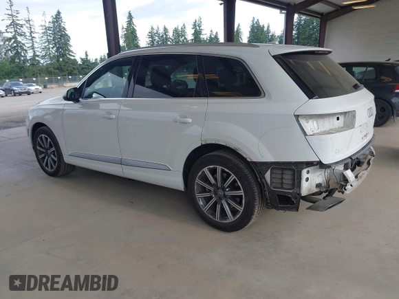 2017 Audi Q7 Premium with VIN WA1AAAF74HD006104, listed as a IAAI auction lot 42554741 with 95,276 mi miles and . Bid and sale history available at DreamBid. Image 3.