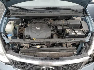2012 Kia Sedona LX with VIN KNDMG4C70C6465733, listed as a Copart auction lot 52017215 with 149,800 mi miles and Salvage Title. Bid and sale history available at carsss.com. Image 12.