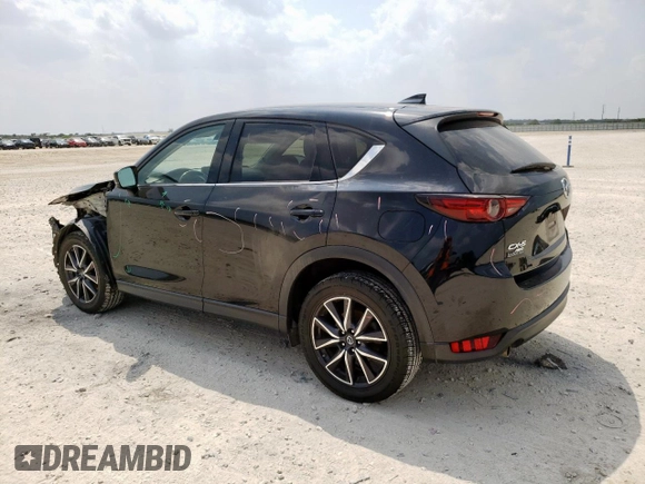 2018 Mazda CX-5 Grand Touring with VIN JM3KFBDM6J0414523, listed as a Copart auction lot 57581145 with 69,353 mi miles and Salvage title. Bid and sale history available at DreamBid. Image 2.
