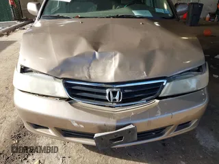 2004 Honda Odyssey EX-RES z VIN 5FNRL18874B127785, wystawiony jako IAAI lot #41141221 z przebiegiem 151 036 mil mil oraz . Historia ofert i sprzedaży dostępna na DreamBid. Obrazek 6.