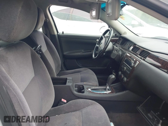 2014 Chevrolet Impala LS with VIN 2G1WA5E31E1163087, listed as a IAAI auction lot 41895666 with 138,348 mi miles and . Bid and sale history available at DreamBid. Image 5.