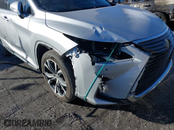 2018 Lexus RX 350 z VIN 2T2ZZMCA6JC096728, wystawiony jako IAAI lot #41356629 z przebiegiem 76 982 mil mil oraz . Historia ofert i sprzedaży dostępna na DreamBid. Obrazek 6.