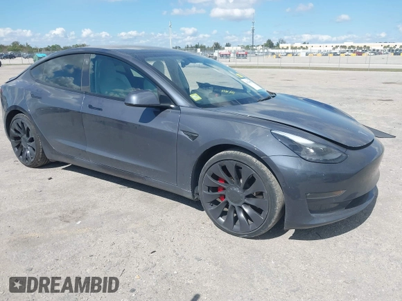 2022 Tesla Model 3 Performance with VIN 5YJ3E1EC9NF201184, listed as a IAAI auction lot 41534959 with 29,389 mi miles and . Bid and sale history available at DreamBid. Image 1.