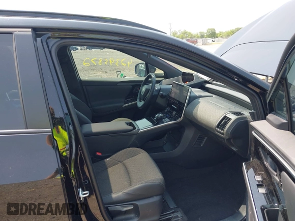 2024 Toyota bZ4X XLE with VIN JTMABACA7RA061457, listed as a IAAI auction lot 42395872 with 16,558 mi miles and . Bid and sale history available at DreamBid. Image 5.