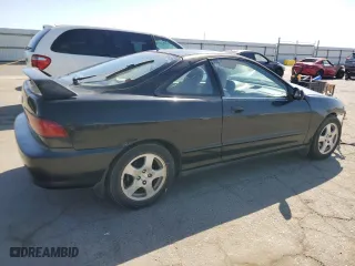 1999 Acura Integra LS with VIN JH4DC4450XS011986, listed as a Copart auction lot 72656914 with 197,567 mi miles and Salvage Title. Bid and sale history available at carsss.com. Image 3.