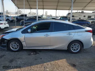 2019 Toyota Prius L Eco with VIN JTDKARFU2K3082593, listed as a IAAI auction lot 41657698 with 239,412 mi miles. Bid and sale history available at carsss.com. Image 14.