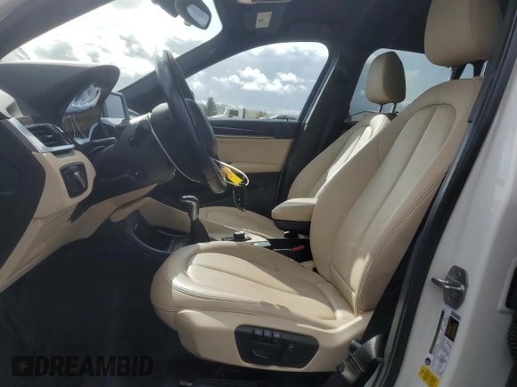 2017 BMW X1 sDrive28i with VIN WBXHU7C33H5H32827, listed as a Copart auction lot 50348265 with 117,412 mi miles and Salvage Title. Bid and sale history available at carsss.com. Image 7.