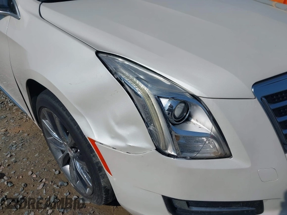 2014 Cadillac XTS with VIN 2G61L5S3XE9231858, listed as a IAAI auction lot 41941564 with 158,479 mi miles. Bid and sale history available at carsss.com. Image 6.