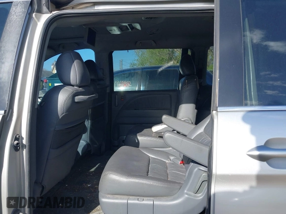 2006 Honda Odyssey EX-L z VIN 5FNRL38786B428264, wystawiony jako IAAI lot #41974479 z przebiegiem 187 595 mil mil oraz . Historia ofert i sprzedaży dostępna na DreamBid. Obrazek 8.