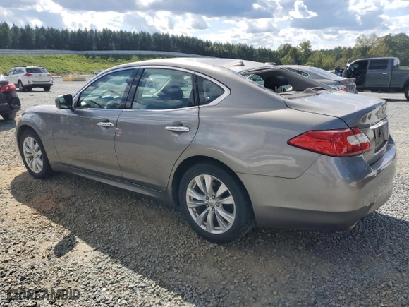 2011 Infiniti M37 with VIN JN1BY1APXBM325191, listed as a Copart auction lot 74209614 with 136,662 mi miles and Salvage Title. Bid and sale history available at carsss.com. Image 2.