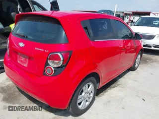 2014 Chevrolet Sonic LT with VIN 1G1JC6SH7E4135650, listed as a IAAI auction lot 41954694 with 103,944 mi miles. Bid and sale history available at carsss.com. Image 4.