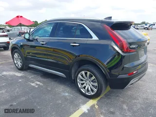 2023 Cadillac XT4 FWD Premium Luxury with VIN 1GYFZCR44PF170452, listed as a IAAI auction lot 42084960 with 22,212 mi miles. Bid and sale history available at carsss.com. Image 3.