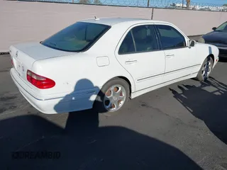 2002 Mercedes-Benz E-Class with VIN WDBJF65J22B455901, listed as a IAAI auction lot 41679008 with 153,854 mi miles. Bid and sale history available at carsss.com. Image 4.