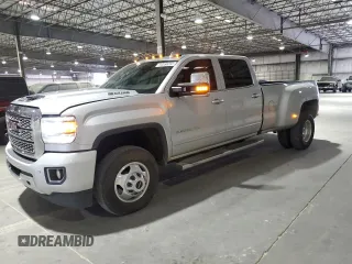 2019 GMC Sierra 3500HD Denali z VIN 1GT42WEY3KF117150, wystawiony jako Copart lot #50558255 z przebiegiem 120 955 mil mil oraz Tytuł czysty. Historia ofert i sprzedaży dostępna na DreamBid. Obrazek 1.