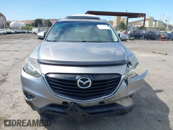 2014 Mazda CX-9 Grand Touring z VIN JM3TB2DVXE0432991, wystawiony jako IAAI lot #42826784 z przebiegiem 134 265 mil mil oraz . Historia ofert i sprzedaży dostępna na DreamBid. Obrazek 12.