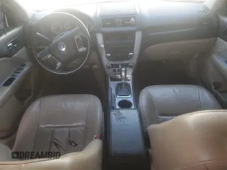 2010 Mercury Milan Premier with VIN 3MEHM0JG0AR653060, listed as a Copart auction lot 52223325 with 237,290 mi miles and Salvage Title. Bid and sale history available at DreamBid. Image 8.