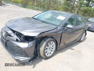 2019 Toyota Camry LE with VIN 4T1B11HK9KU229110, listed as a IAAI auction lot 42133332 with 17,541 mi miles and . Bid and sale history available at DreamBid. Image 19.