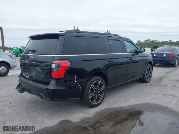 2020 Ford Expedition Max Limited with VIN 1FMJK2AT9LEA05493, listed as a IAAI auction lot 41395161 with 36,752 mi miles. Bid and sale history available at carsss.com. Image 4.