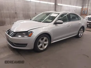 2013 Volkswagen Passat SE with VIN 1VWBH7A39DC145297, listed as a IAAI auction lot 42048991 with 146,897 mi miles and . Bid and sale history available at DreamBid. Image 18.