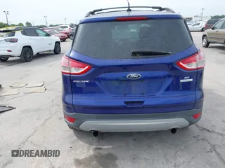 2013 Ford Escape SE with VIN 1FMCU0GXXDUB85818, listed as a IAAI auction lot 41848033 with 128,638 mi miles and . Bid and sale history available at DreamBid. Image 16.