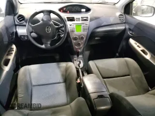 2010 Toyota Yaris with VIN JTDBT4K3XA1382385, listed as a Copart auction lot 48544795 with 169,664 mi miles and Salvage Title. Bid and sale history available at DreamBid. Image 8.