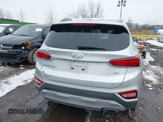 2019 Hyundai Santa Fe Ultimate with VIN 5NMS5CAD1KH000394, listed as a IAAI auction lot 41455421 with 42,886 mi miles and . Bid and sale history available at DreamBid. Image 16.