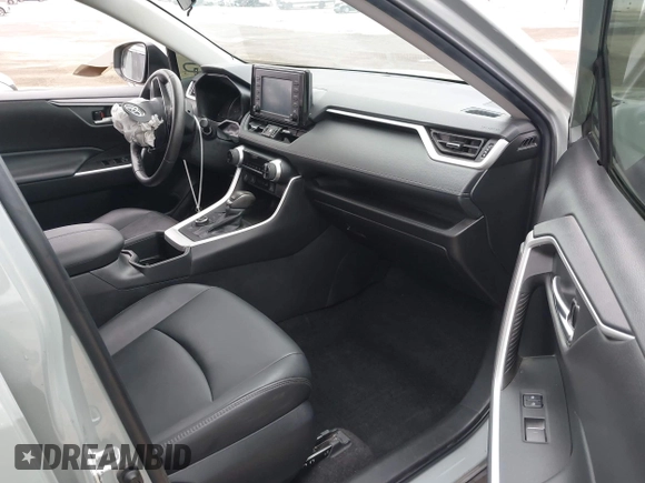 2022 Toyota RAV4 Hybrid XLE Premium with VIN 4T3B6RFV8NU102695, listed as a IAAI auction lot 42385078 with 35,614 mi miles and . Bid and sale history available at DreamBid. Image 5.