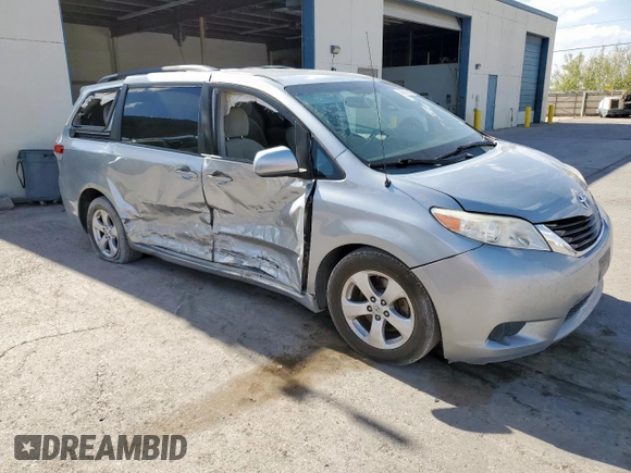 2014 Toyota Sienna LE AAS with VIN 5TDKK3DCXES518968, listed as a Copart auction lot 59553905 with 176,074 mi miles and Salvage title. Bid and sale history available at DreamBid. Image 4.