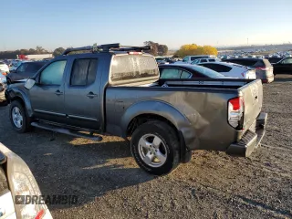 2007 Nissan Frontier SE with VIN 1N6AD09W47C438493, listed as a Copart auction lot 82595824 with 97,541 mi miles and Salvage title. Bid and sale history available at DreamBid. Image 2.