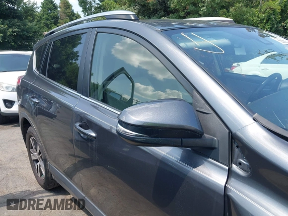 2018 Toyota RAV4 XLE with VIN JTMWFREV9JJ201845, listed as a IAAI auction lot 42442303 with 111,177 mi miles and . Bid and sale history available at DreamBid. Image 13.